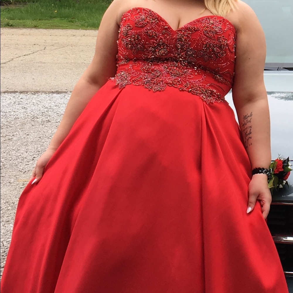 Red strapless prom gown